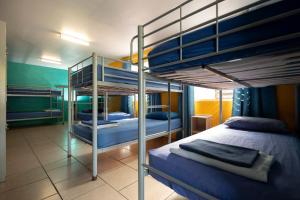 Postel nebo postele na pokoji v ubytování 1770 Beachside Backpacker + 37 fotografií