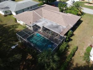 an overhead view of a house with a swimming pool at Vacation Home on Coral Sands in Venice