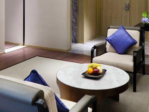 Posezení v ubytování Primus Hotel Shanghai Sanjiagang - Offer Pudong International Airport and Disney shuttle