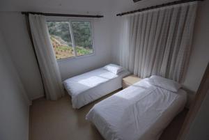 Katil atau katil-katil dalam bilik di Penthouse With Breathtaking Panoramic Views of Mediterranean sea and Mountain +34 gambar