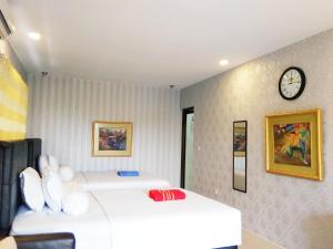 Voodi või voodid majutusasutuse Jos & Hanny Homestay toas