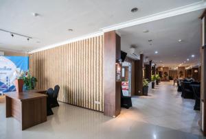 The lobby or reception area at Royal Park Hotel