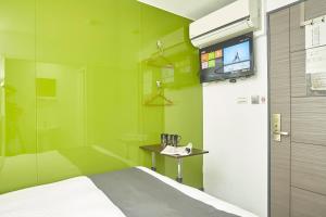 TV a/nebo společenská místnost v ubytování T.O. Hotel Chengde + 23 fotografií