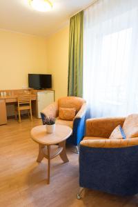 TV a/nebo společenská místnost v ubytování Hotel Vita