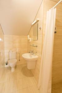 Koupelna v ubytování Hotel Vita
