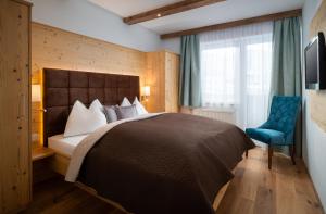 מיטה או מיטות בחדר ב-Bergnest die Frühstückspension