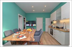 A kitchen or kitchenette at Sophia's Penthouse Apartment With Jacuzzi and Acropolis View From Big Terrace