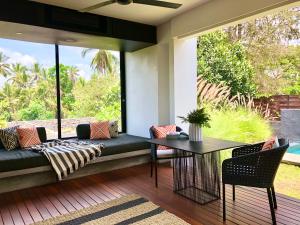 Posezení v ubytování Origin Ubud