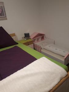 Postel nebo postele na pokoji v ubytování Ferienwohnung Stubenböck
