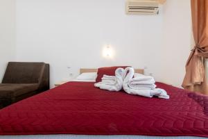 Postel nebo postele na pokoji v ubytování Hotel Ami - M