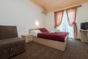 Postel nebo postele na pokoji v ubytování Hotel Ami - M