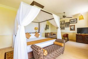En eller flere senge i et værelse på Riu Palace Zanzibar - All Inclusive - Adults Only