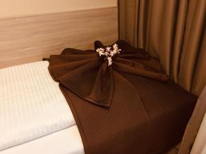 Postel nebo postele na pokoji v ubytování Hotel Glinde