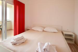 Cama o camas de una habitación en Apartments Bella