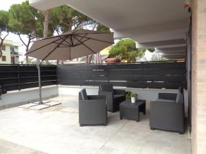A seating area at Caput Mundi Anagina IV