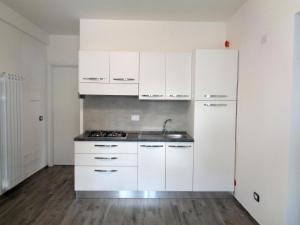 A kitchen or kitchenette at Caput Mundi Anagina IV