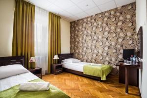 Posteľ alebo postele v izbe v ubytovaní Centrum Konferencyjno Wypoczynkowe Szelment + 23 fotografií