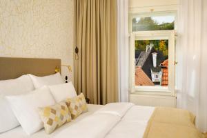 Voodi või voodid majutusasutuse Hotel OLDINN toas