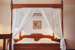 Postel nebo postele na pokoji v ubytování FETZ DAS LORELEY HOTEL