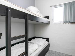 Postel nebo postele na pokoji v ubytování Apartment Brovst II + 15 fotografií