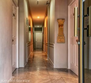a hallway of a house with a long corridor at Hotel Kata Hill Sea View in Kata Beach