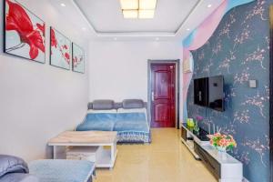 TV i/ili multimedijalni sistem u objektu Utopia Apartment