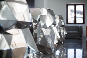 a close up of a glass sculpture on a table at Hotel Art Al Boschetto in Castel Volturno