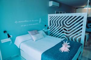 Postel nebo postele na pokoji v ubytování APARTMENT LA CALA DREAM & SEA VIEW
