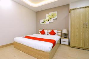 Postel nebo postele na pokoji v ubytování Tuan Anh Hotel