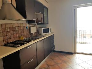 Cucina o angolo cottura di Hotel Vello d'Oro