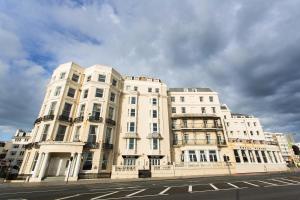 a large white building on the side of a street at The Royal Albion Seafront Hotel in Brighton & Hove