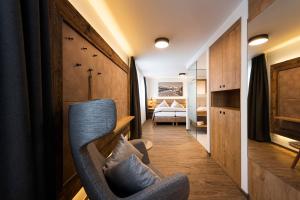 Postel nebo postele na pokoji v ubytování Hotel Brugger