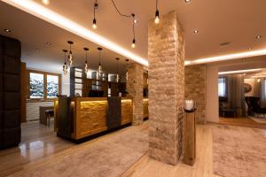 Posezení v ubytování Hotel Brugger