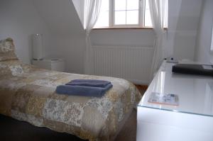 
A bed or beds in a room at Ballyrusley B&B
