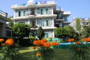 Jardí fora de Hotel Noble Inn花椒客栈