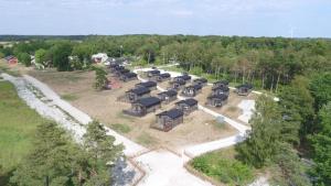 an aerial view of a group of houses at Fide Äventyrsby & Camping in Fidenäs