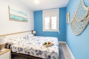 A bed or beds in a room at Tarrapolita_Rambla