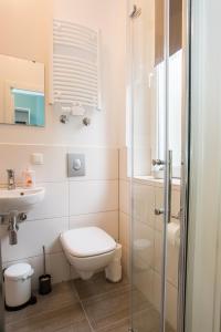 Ένα μπάνιο στο Studio Apartments nahe Messe +26 φωτογραφίες