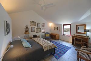 Postel nebo postele na pokoji v ubytování Quinta da Ferradosa Wines