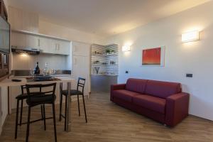 Η κουζίνα ή μικρή κουζίνα στο Astra Roma Apartments