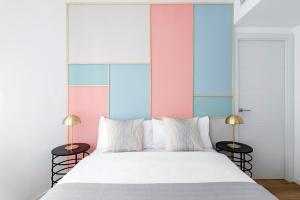 Lova arba lovos apgyvendinimo įstaigoje Color Apartments by Olala Homes