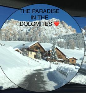 a car mirror with the parable in the doughnuts at Ciasa Rü in San Cassiano