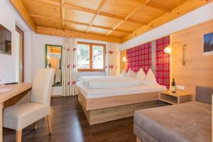Letto o letti in una camera di Hettlerhof