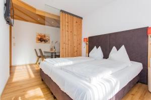 Letto o letti in una camera di Hettlerhof
