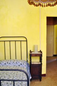 Postel nebo postele na pokoji v ubytování Agriturismo Olivazzi