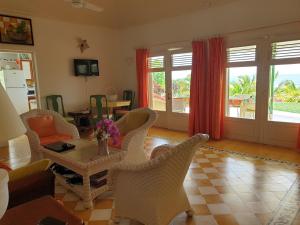 Posezení v ubytování Villa Guadeloupe Saint François Accès Mer Piscine IGUANA BAY - Villa Zagadi
