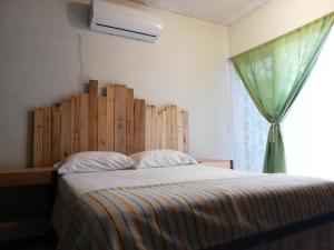 Postel nebo postele na pokoji v ubytování Bermejo Hostel