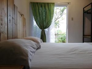 Postel nebo postele na pokoji v ubytování Bermejo Hostel