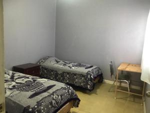 Ένα ή περισσότερα κρεβάτια σε δωμάτιο στο Hotel Fundadores Torreón