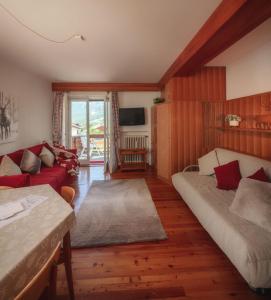 TV a/nebo společenská místnost v ubytování Cortina-House